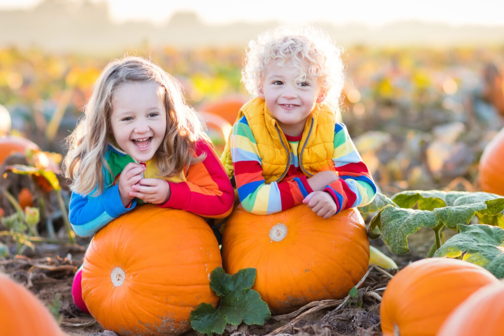 Kids Picking Pumpkins