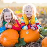 Kids Picking Pumpkins