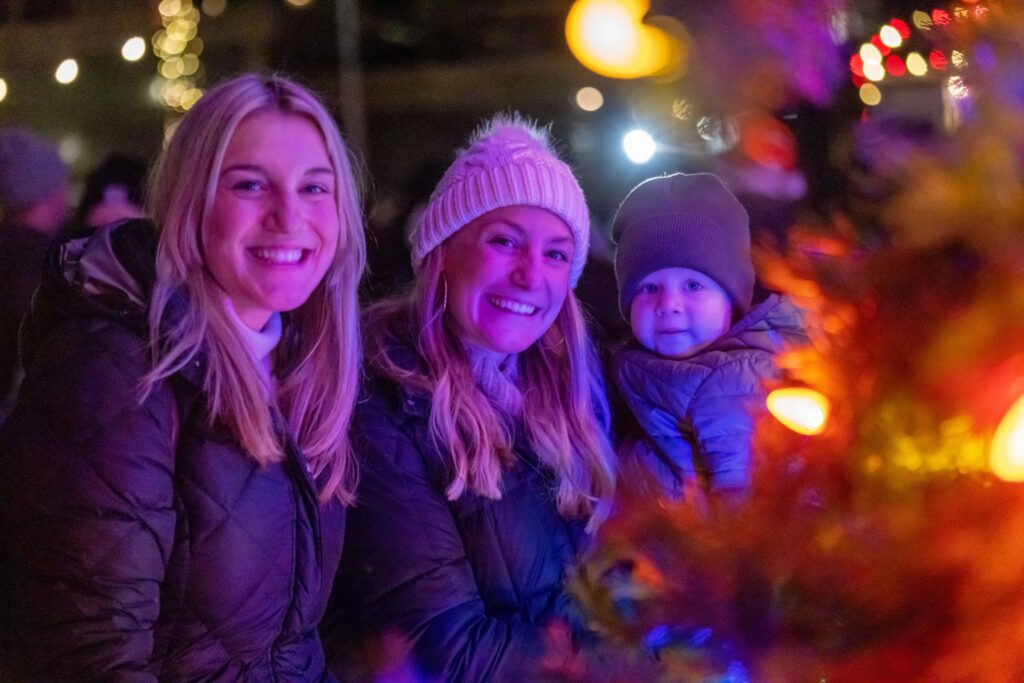 Erie Downtown D'lights women enjoying the light displays